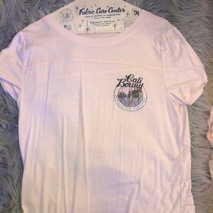 pink short sleeved shirt